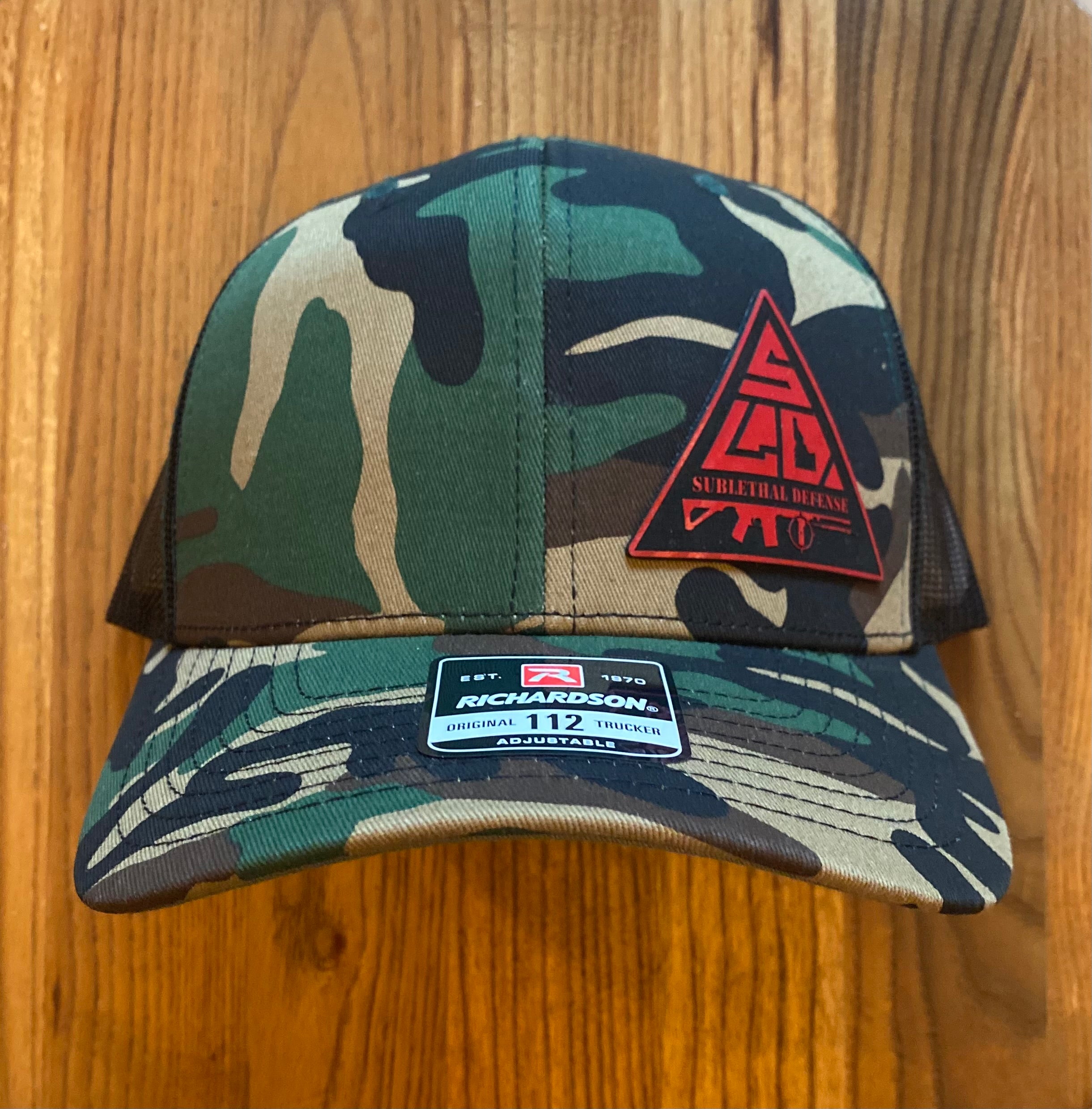 SUB-LETHAL DEFENSE SNAP BACK HAT (CAMO)